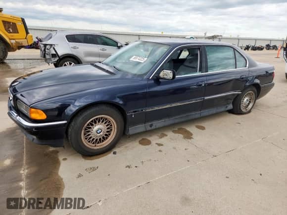 1997 BMW 7 Series 740iL with VIN WBAGJ8322VDL43008, listed as a Copart auction lot 66674325 with 118,401 mi miles and Salvage title. Bid and sale history available at DreamBid. Image 1.