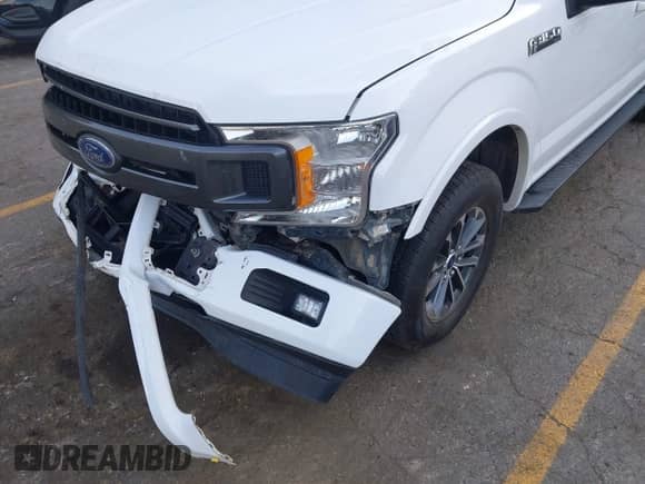 2019 Ford F-150 XLT z VIN 1FTEW1EP0KKD88077, wystawiony jako IAAI lot #43125919 z przebiegiem 80 967 mil mil oraz . Historia ofert i sprzedaży dostępna na DreamBid. Obrazek 6.