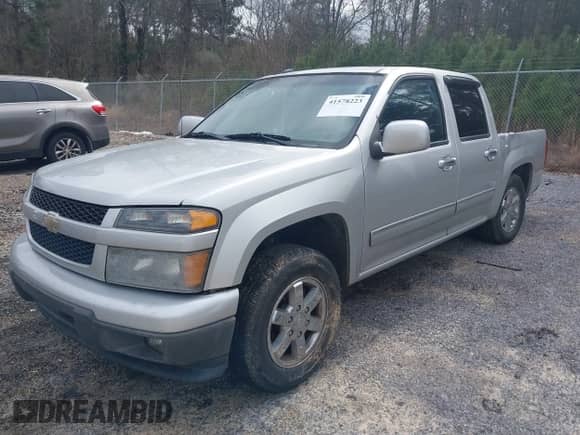2010 Chevrolet Colorado 1LT z VIN 1GCDSCDE7A8143405, wystawiony jako IAAI lot #41578223 z przebiegiem 158 886 mil mil oraz . Historia ofert i sprzedaży dostępna na DreamBid. Obrazek 17.