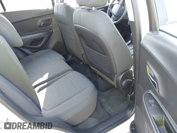 2018 Chevrolet Trax LS z VIN KL7CJNSBXJB647725, wystawiony jako IAAI lot #41909374 z przebiegiem 68 135 mil mil oraz . Historia ofert i sprzedaży dostępna na DreamBid. Obrazek 8.