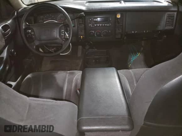 2003 Dodge Dakota Sport with VIN 1D7HG38X83S300059, listed as a Copart auction lot 61420305 with 230,971 mi miles and Salvage title. Bid and sale history available at DreamBid. Image 8.