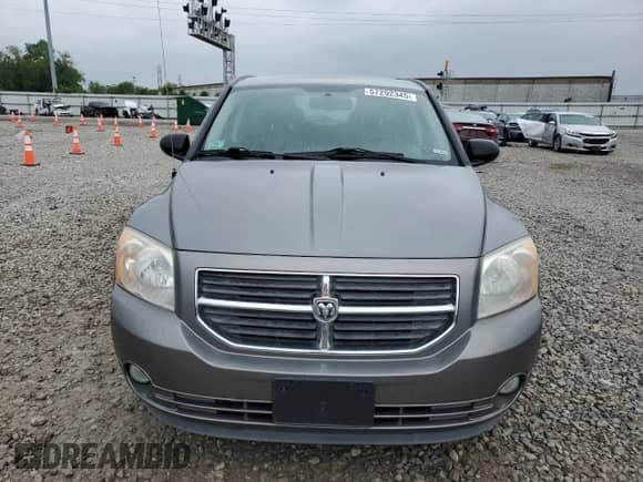 2011 Dodge Caliber Mainstreet with VIN 1B3CB3HA2BD255221, listed as a Copart auction lot 57292345 with 68,568 mi miles and Salvage title. Bid and sale history available at DreamBid. Image 5.