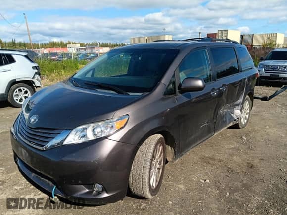 2015 Toyota Sienna Limited with VIN 5TDDK3DC5FS094285, listed as a Copart auction lot 69846845 with 104,048 mi miles and Salvage title. Bid and sale history available at DreamBid. Image 1.