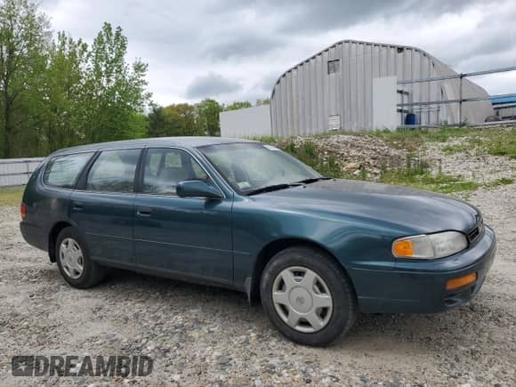 1996 Toyota Camry LE with VIN 4T1EF12K7TU140984, listed as a Copart auction lot 56908645 with 67,137 mi miles and Clean title. Bid and sale history available at DreamBid. Image 4.