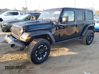 2024 Jeep Wrangler Rubicon с VIN 1C4RJXR63RW167211, выставлен на аукционе Copart как лот 89889475 с пробегом 14 770 миль миль и Списание • Salvage title. История ставок и продаж доступна на DreamBid. Изображение 1.