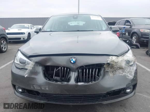 2015 BMW 5 Series 535i Gran Turismo z VIN WBA5M2C5XFD872228, wystawiony jako IAAI lot #42737501 z przebiegiem 71 027 mil mil oraz . Historia ofert i sprzedaży dostępna na DreamBid. Obrazek 12.