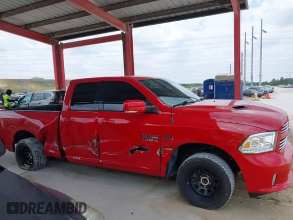 2014 Ram 1500 Sport with VIN 1C6RR6HT8ES154232, listed as a IAAI auction lot 42051723 with 122,982 mi miles and . Bid and sale history available at DreamBid. Image 13.