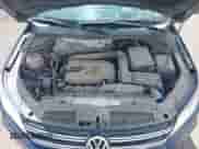 2013 Volkswagen Tiguan SE z VIN WVGAV3AX1DW560501, wystawiony jako IAAI lot #42287579 z przebiegiem 180 367 mil mil oraz . Historia ofert i sprzedaży dostępna na DreamBid. Obrazek 10.