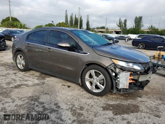 2015 Chevrolet Volt z VIN 1G1RB6E41FU126796, wystawiony jako Copart lot #75761653 z przebiegiem 75 273 mil mil oraz . Historia ofert i sprzedaży dostępna na DreamBid. Obrazek 4.