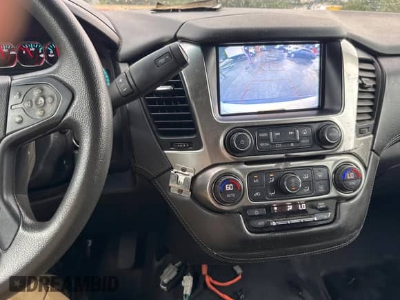 2019 Chevrolet Tahoe Commercial z VIN 1GNLCDECXKR281986, wystawiony jako Copart lot #63148895 z przebiegiem 103 693 mil mil oraz Czysty tytuł • Clean title. Historia ofert i sprzedaży dostępna na DreamBid. Obrazek 9.