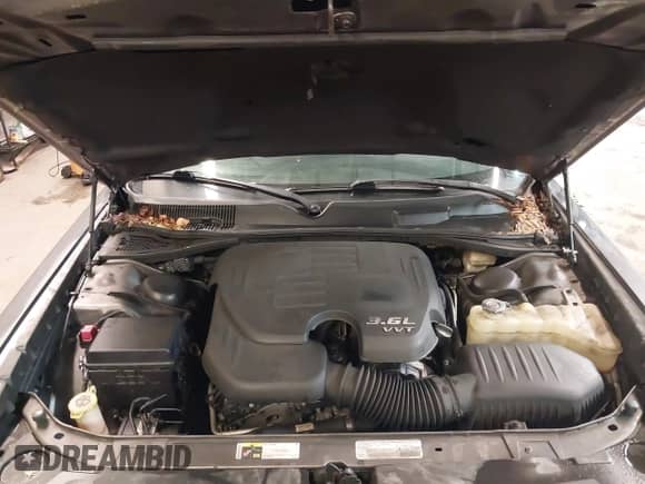 2013 Dodge Challenger SXT с VIN 2C3CDYAG5DH593050, выставлен на аукционе IAAI как лот 43392807 с пробегом 163 707 миль миль и . История ставок и продаж доступна на DreamBid. Изображение 10.
