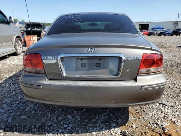 2003 Hyundai Sonata с VIN KMHWF25S43A729465, выставлен на аукционе Copart как лот 57914175 с пробегом 202 586 миль миль и Списание • Salvage title. История ставок и продаж доступна на DreamBid. Изображение 6.