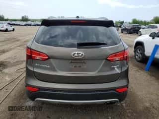 2014 Hyundai Santa Fe z VIN 5XYZU3LB5EG159334, wystawiony jako Copart lot #59119255 z przebiegiem 196 591 mil mil oraz Szkoda całkowita • Salvage title. Historia ofert i sprzedaży dostępna na DreamBid. Obrazek 6.