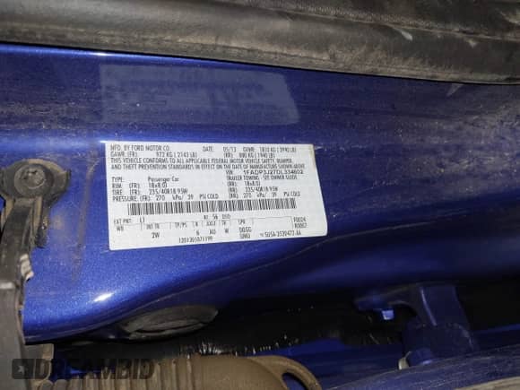 2013 Ford Focus Titanium z VIN 1FADP3J27DL334602, wystawiony jako IAAI lot #43559981 z przebiegiem 123 971 mil mil oraz . Historia ofert i sprzedaży dostępna na DreamBid. Obrazek 9.