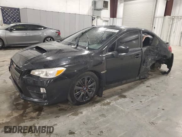 2015 Subaru WRX with VIN JF1VA1A62F9828475, listed as a Copart auction lot 64818785 with 145,553 mi miles and Salvage title. Bid and sale history available at DreamBid. Image 1.