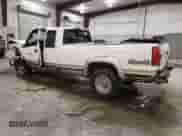 1998 Chevrolet Silverado 2500 with VIN 1GCGK29J0WE209704, listed as a Copart auction lot 72757704 with 253,031 mi miles and Salvage title. Bid and sale history available at DreamBid. Image 2.