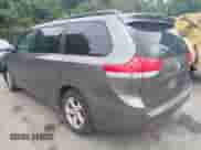 2014 Toyota Sienna LE AAS with VIN 5TDKK3DC2ES459012, listed as a IAAI auction lot 43038989 with 330,758 mi miles and . Bid and sale history available at DreamBid. Image 3.