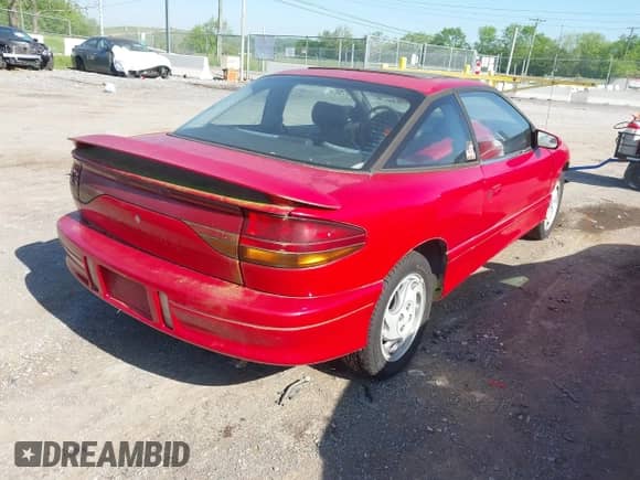1996 Saturn 2dr Coupe with VIN 1G8ZH1275TZ263109, listed as a IAAI auction lot 42084877 with 131,134 mi miles and . Bid and sale history available at DreamBid. Image 4.