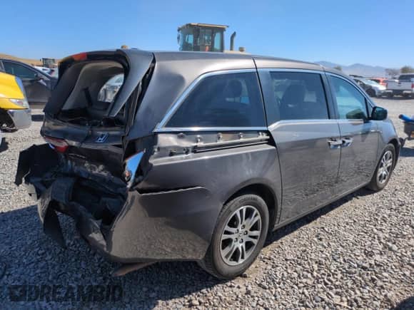 2013 Honda Odyssey EX-L with VIN 5FNRL5H61DB027011, listed as a Copart auction lot 69470375 with 123,161 mi miles and Salvage title. Bid and sale history available at DreamBid. Image 3.