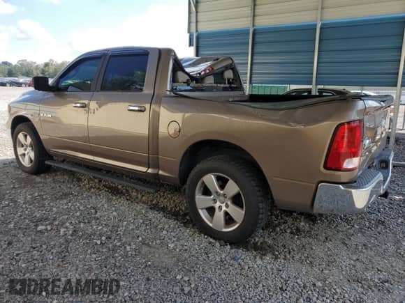 2009 Dodge 1500 SLT with VIN 1D3HB13T09S736549, listed as a Copart auction lot 73873824 with 176,610 mi miles and Salvage title. Bid and sale history available at DreamBid. Image 2.