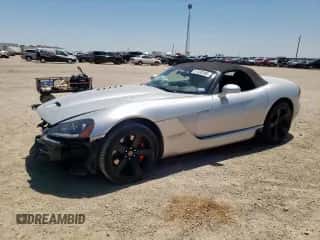 2004 Dodge Viper SRT-10 with VIN 1B3JZ65Z24V101801, listed as a Copart auction lot 57433105 with 21,314 mi miles and Salvage title. Bid and sale history available at DreamBid. Image 1.