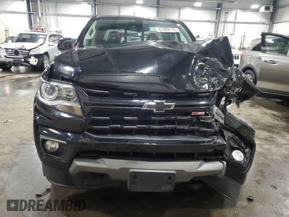 2021 Chevrolet Colorado 4WD Z71 with VIN 1GCGTDEN8M1171810, listed as a Copart auction lot 57409115 with 100,579 mi miles and Salvage title. Bid and sale history available at DreamBid. Image 5.