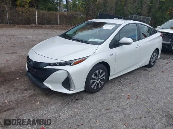 2022 Toyota Prius XLE with VIN JTDKAMFP9N3220440, listed as a IAAI auction lot 43428027 with 34,374 mi miles and . Bid and sale history available at DreamBid. Image 2.
