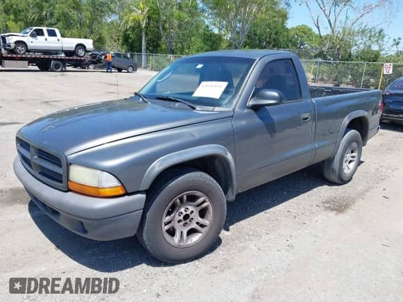 2003 Dodge Dakota z VIN 1D7FL16X53S361797, wystawiony jako IAAI lot #42056555 z przebiegiem 243 771 mil mil oraz . Historia ofert i sprzedaży dostępna na DreamBid. Obrazek 2.
