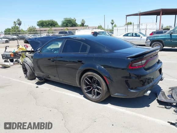 2022 Dodge Charger Scat Pack with VIN 2C3CDXGJ5NH181418, listed as a IAAI auction lot 42619564 with Not provided miles and . Bid and sale history available at DreamBid. Image 3.