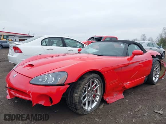 2005 Dodge Viper SRT-10 with VIN 1B3JZ65Z25V500516, listed as a IAAI auction lot 42000783 with 13,090 mi miles and . Bid and sale history available at DreamBid. Image 18.