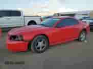 2003 Ford Mustang Standard z VIN 1FAFP40403F327196, wystawiony jako Copart lot #82540835 z przebiegiem 66 667 mil mil oraz Szkoda całkowita • Salvage title. Historia ofert i sprzedaży dostępna na DreamBid. Obrazek 1.