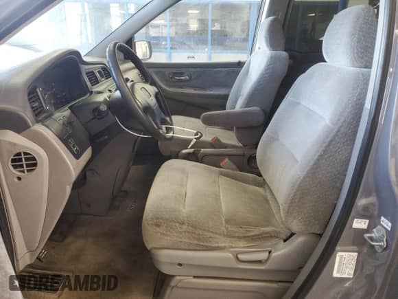 1999 Honda Odyssey LX with VIN 2HKRL1850XH503979, listed as a Copart auction lot 80888115 with 269,275 mi miles and Clean title. Bid and sale history available at DreamBid. Image 7.