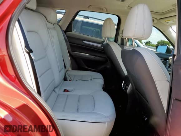 2024 Mazda CX-5 S Carbon Edition z VIN JM3KFBCL4R0423435, wystawiony jako Copart lot #68526055 z przebiegiem 17 477 mil mil oraz Szkoda całkowita • Salvage title. Historia ofert i sprzedaży dostępna na DreamBid. Obrazek 11.