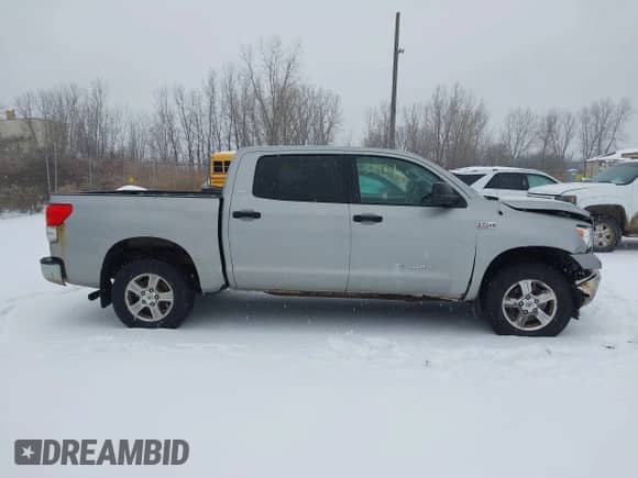 2008 Toyota Tundra with VIN 5TBDV54118S498651, listed as a IAAI auction lot 41139461 with 243,235 mi miles and . Bid and sale history available at DreamBid. Image 13.