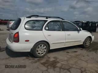 2000 Hyundai Elantra с VIN KMHJW35FXYU180041, выставлен на аукционе Copart как лот 63281285 с пробегом 132 766 миль миль и Списание • Salvage title. История ставок и продаж доступна на DreamBid. Изображение 3.