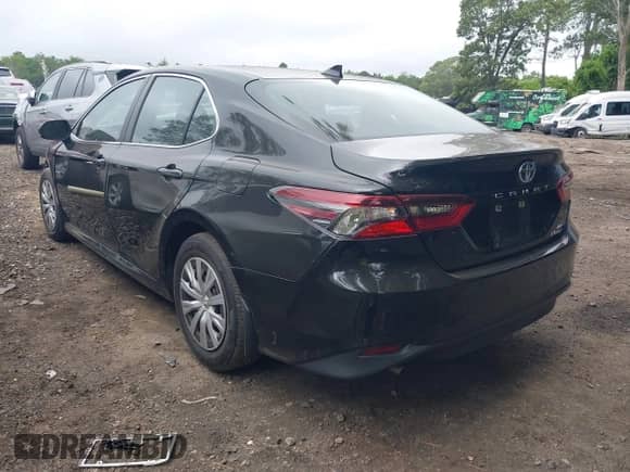 2022 Toyota Camry Hybrid LE with VIN 4T1C31AK3NU570645, listed as a IAAI auction lot 42659916 with 19,420 mi miles and . Bid and sale history available at DreamBid. Image 3.