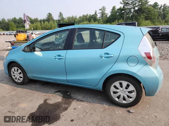 2014 Toyota Prius One with VIN JTDKDTB34E1074738, listed as a Copart auction lot 67398885 with 157,213 mi miles and Salvage title. Bid and sale history available at DreamBid. Image 2.