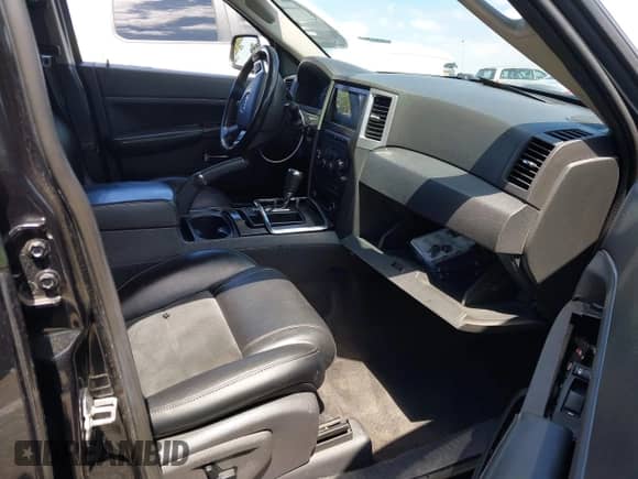 2009 Jeep Grand Cherokee with VIN 1J8HR78W89C520526, listed as a IAAI auction lot 43193483 with 102,738 mi miles and . Bid and sale history available at DreamBid. Image 5.