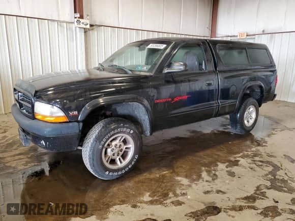 1999 Dodge Dakota с VIN 1B7GG26X5XS216564, выставлен на аукционе Copart как лот 85286805 с пробегом 183 423 миль миль и Списание • Salvage title. История ставок и продаж доступна на DreamBid. Изображение 1.