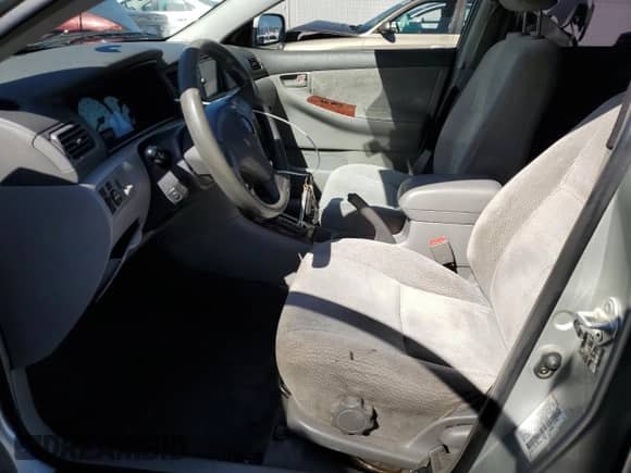 2003 Toyota Corolla CE с VIN JTDBR32E630014482, выставлен на аукционе Copart как лот 87056125 с пробегом 153 779 миль миль и Списание • Salvage title. История ставок и продаж доступна на DreamBid. Изображение 7.