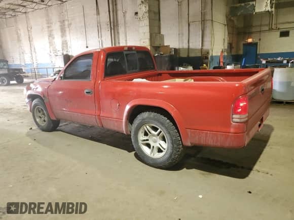 1999 Dodge Dakota SLT with VIN 1B7GL26Z4XS233613, listed as a Copart auction lot 89320955 with 221,289 mi miles and Clean title. Bid and sale history available at DreamBid. Image 2.