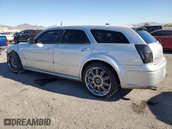 2006 Dodge Magnum R/T с VIN 2D8GV57286H122762, выставлен на аукционе Copart как лот 83399984 с пробегом 200 443 миль миль и Списание • Salvage title. История ставок и продаж доступна на DreamBid. Изображение 2.