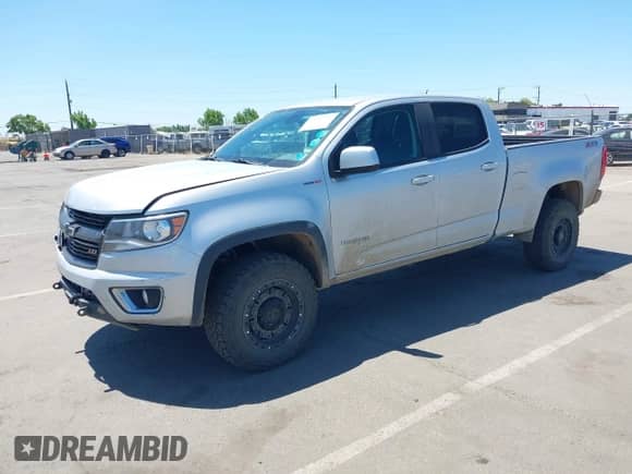 2018 Chevrolet Colorado 4WD Z71 with VIN 1GCPTDE16J1150026, listed as a IAAI auction lot 42185263 with 99,841 mi miles and . Bid and sale history available at DreamBid. Image 2.