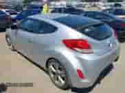 2012 Hyundai Veloster w/Gray Int z VIN KMHTC6AD6CU079711, wystawiony jako IAAI lot #41750279 z przebiegiem 154 746 mil mil oraz . Historia ofert i sprzedaży dostępna na DreamBid. Obrazek 3.