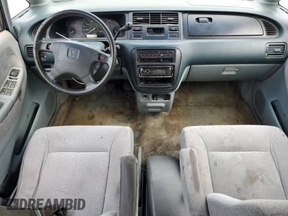 1997 Honda Odyssey LX с VIN JHMRA1868VC020262, выставлен на аукционе Copart как лот 69304674 с пробегом 138 050 миль миль и Списание • Salvage title. История ставок и продаж доступна на DreamBid. Изображение 8.