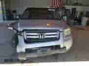 2007 Honda Pilot LX с VIN 5FNYF28197B003307, выставлен на аукционе Copart как лот 67850535 с пробегом 153 609 миль миль и Списание • Salvage title. История ставок и продаж доступна на DreamBid. Изображение 5.