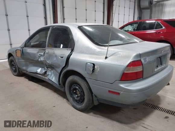 1995 Honda Accord LX with VIN 1HGCD5637SA100093, listed as a IAAI auction lot 43136050 with 153,199 mi miles and . Bid and sale history available at DreamBid. Image 3.