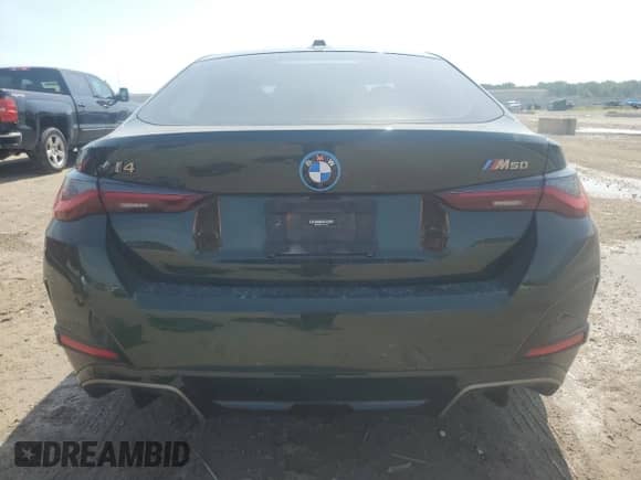2023 BMW i4 M50 with VIN WBY33AW07PFP22928, listed as a Copart auction lot 65717325 with 62,412 mi miles and Salvage title. Bid and sale history available at DreamBid. Image 6.