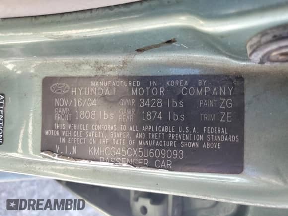 2005 Hyundai Accent GLS z VIN KMHCG45CX5U609093, wystawiony jako Copart lot #81697905 z przebiegiem 144 055 mil mil oraz Szkoda całkowita • Salvage title. Historia ofert i sprzedaży dostępna na DreamBid. Obrazek 13.