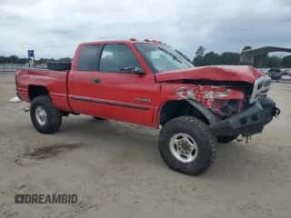 2000 Dodge 2500 with VIN 1B7KF236XYJ100955, listed as a Copart auction lot 70304884 with 250,592 mi miles and Salvage title. Bid and sale history available at DreamBid. Image 4.